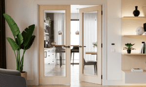 Architectural flush oak glass door pair – prehung door set installed in a modern open-plan interior.