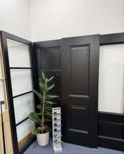 Selection of black internal doors on display at Doorphoria showroom